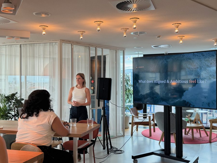 Marjolein van der Krol speaking at the Aligned & Ambitious community event